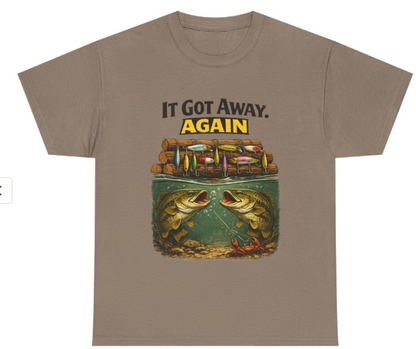 It Got Away Again’ fishing graphic t‑shirt in sand color on flat lay mockup