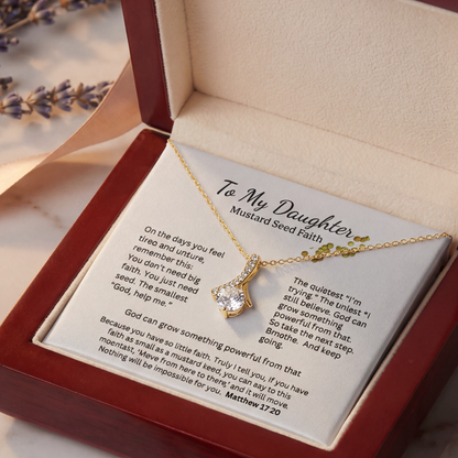 Open gift box showing “To My Daughter Mustard Seed Faith” message card and necklace pendant