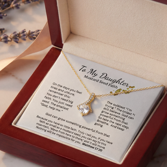 Open gift box showing “To My Daughter Mustard Seed Faith” message card and necklace pendant