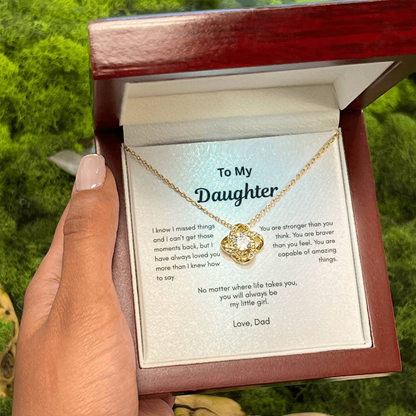 Daughter necklace gift from Dad in premium gift box held by hand outdoors