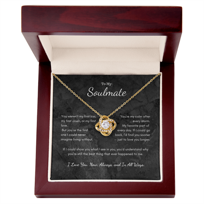 Love Knot necklace presented inside red velvet gift box