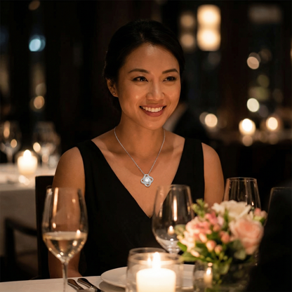 Woman wearing Love Knot necklace at romantic dinner setting