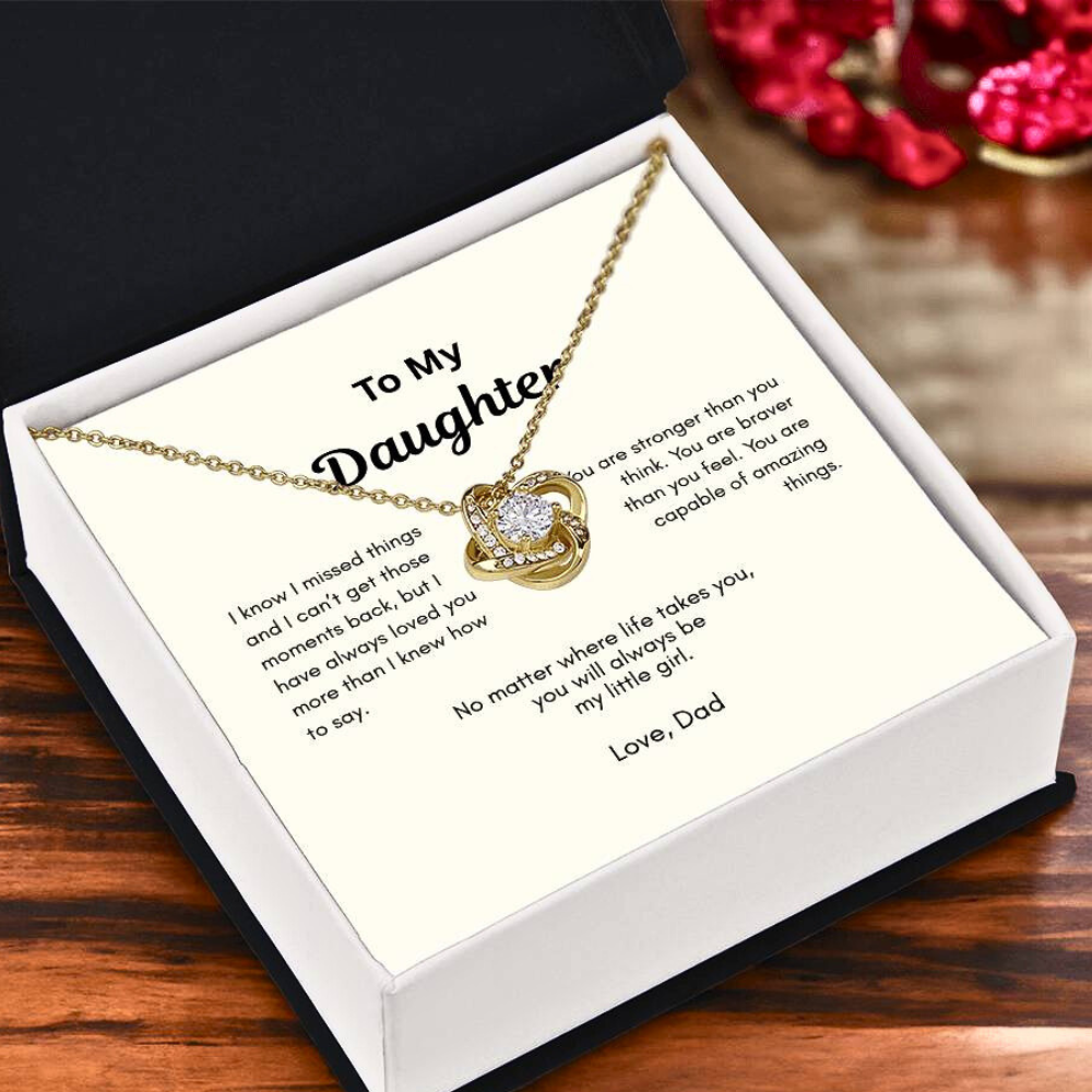 Meaningful daughter necklace gift from Dad with message card shown in soft close-up lifestyle setting