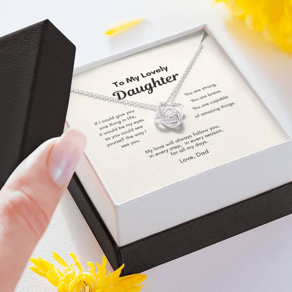 White Gold love knot pendant necklace for daughter displayed with message card