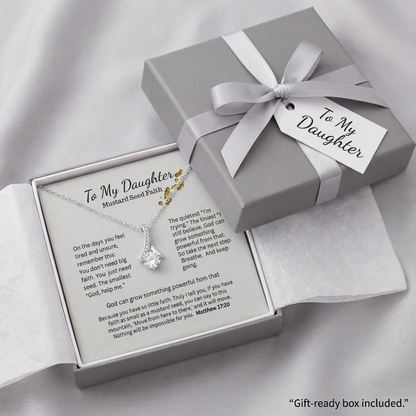 Wrapped gift box with Mustard Seed Faith necklace and message card, ready to give
